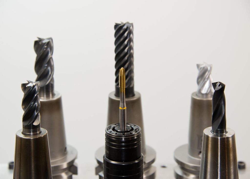 Close Up Photo of Black Metal Drill Bit